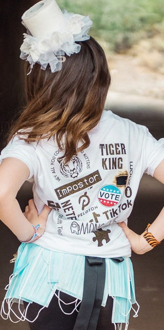 Back of the 2020 costume T-shirt with Tiger King, Tik Tok and Vote patches and the face mask skirt