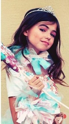 Candyland princess holding a giant lollipop