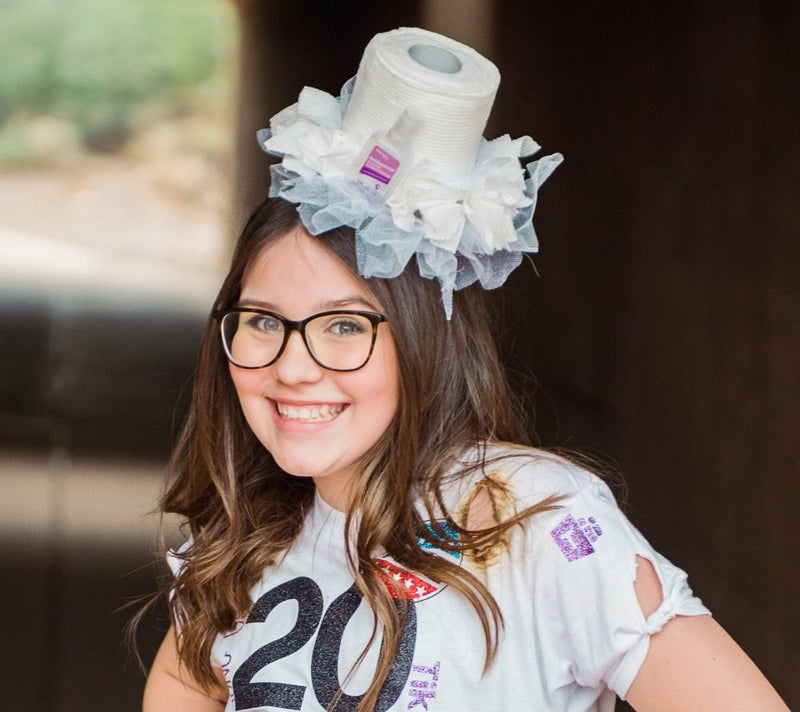 Close-up of the toilet paper top hat and the 2020 T-shirt