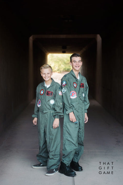 Two boys standing in DIY Top Gun flight suits